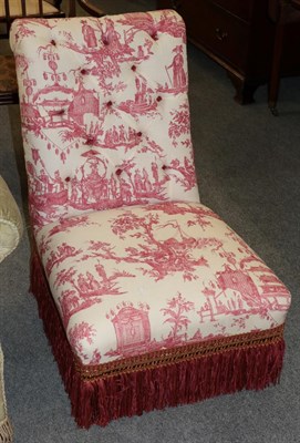 Lot 1325 - A 19th century armchair on mahogany square tapering legs, recovered in buttoned French toile de...