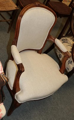 Lot 1328 - An early 20th century walnut framed fauteuil with cream linen upholstery