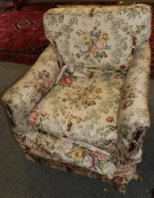 Lot 1337 - A Victorian armchair with floral loose covers, 86cm wide