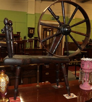 Lot 1342 - A 19th century turned spinning wheel