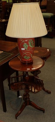 Lot 1345 - A reproduction mahogany revolving occasional table; together with a reproduction table lamp and...