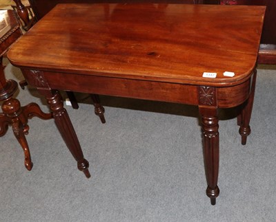 Lot 1347 - A William IV mahogany fold over table