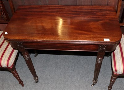 Lot 1363 - A Georgian fold over mahogany tea table; and a pair of late Victorian bedroom chairs (3)