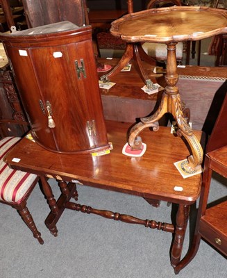 Lot 1364 - A Victorian side table; a wine table with scroll base; and a small mahogany bow fronted cabinet (3)