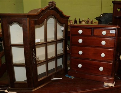 Lot 1369 - A Victorian mahogany stained pine five-drawer chest, with ceramic knob handles; and a...