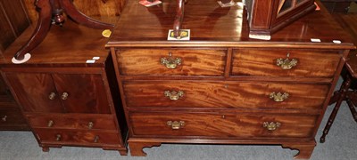 Lot 1376 - A George III mahogany and crossbanded four-drawer chest, 107cm wide; and a mahogany bedside...