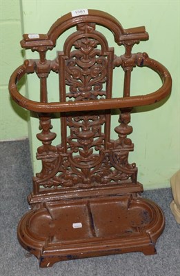 Lot 1381 - A Victorian cast iron stick stand, painted, 40cm wide