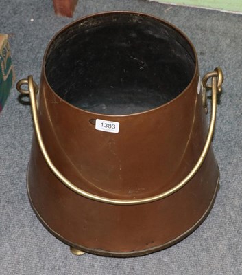 Lot 1383 - A copper and brass coal bucket in the manner of Christopher Dresser