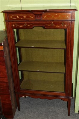 Lot 1386 - An Edwardian mahogany display cabinet decorated with garlands of flowers, 76cm wide