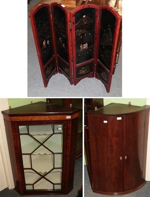 Lot 1387 - A George III mahogany glazed hanging corner cupboard, 76cm wide; a George III mahogany bow...