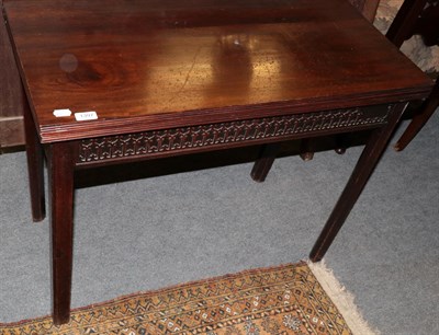 Lot 1397 - A George III mahogany fold over tea table