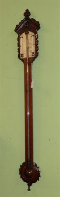 Lot 1399 - A Victorian mahogany Gothic style stick barometer, single ivory scale dial signed Hele Teignmouth