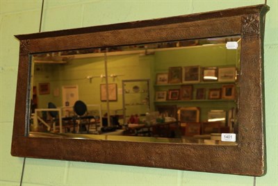 Lot 1401 - A brass Arts and Crafts bevel glass mirror