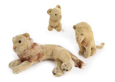 Lot 2003 - Circa 1930's and Later Lion Soft Toys, comprising a Steiff reclining lion, with pink stitched nose