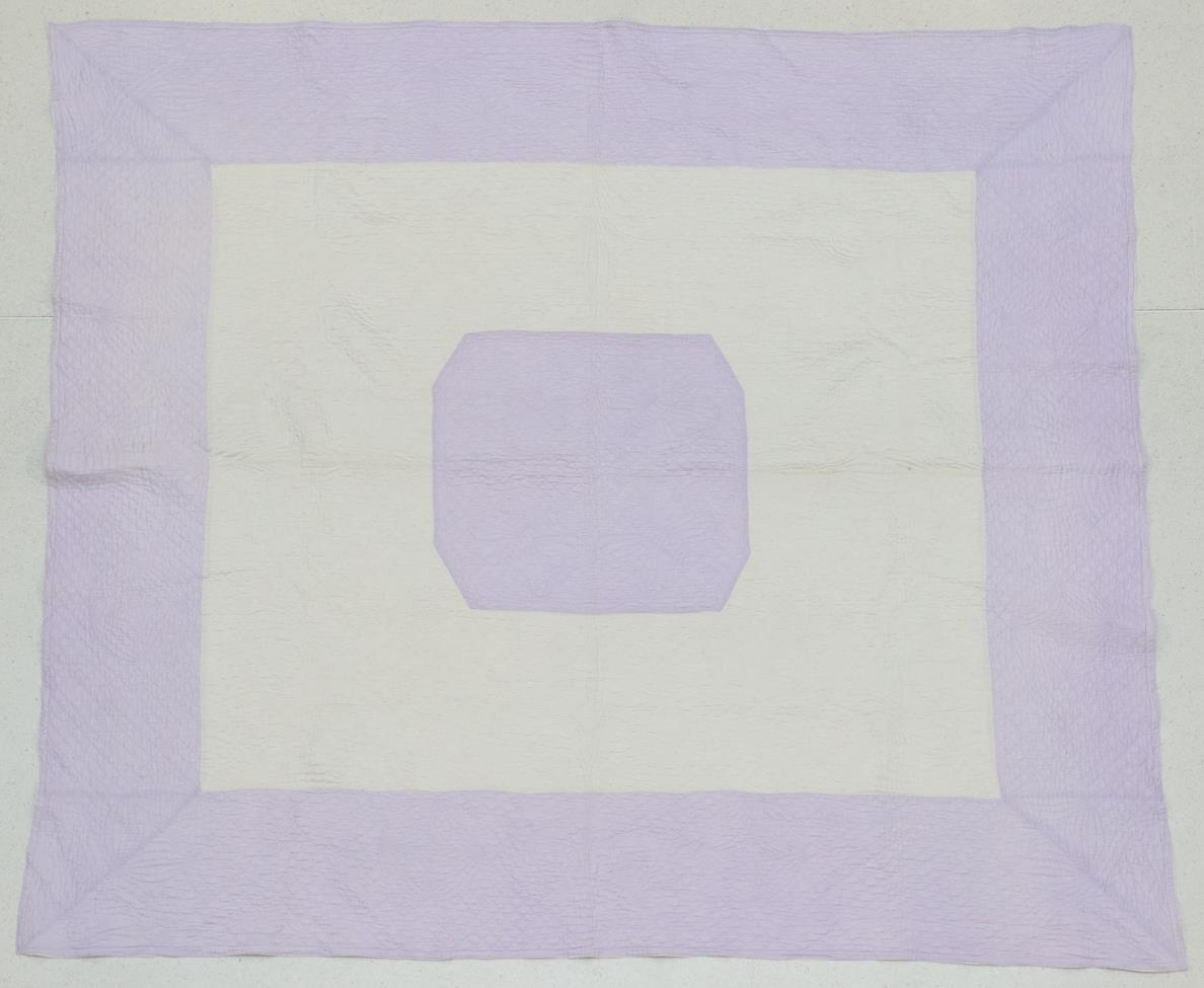 Lot 2014 - Large Early 20th Century Lavender and White Cotton Reversible Quilt, with central lavender...