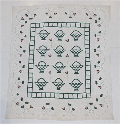 Lot 2017 - A Late 19th Century Unfinished Quilt, appliquéd with green baskets to the centre of the quilt,...