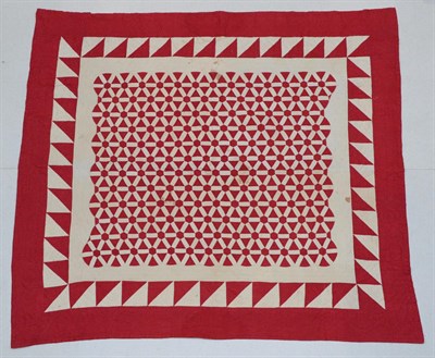 Lot 2018 - Late 19th Century Turkey Red and White Patchwork Quilt, centre worked with hexagonal wheels,...