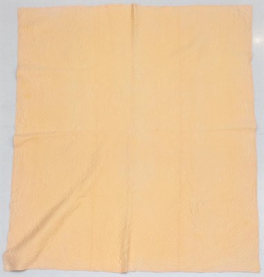 Lot 2022 - Large Early 20th Century Reversible Whole Cloth Quilt, in pale apricot cotton and pale yellow...