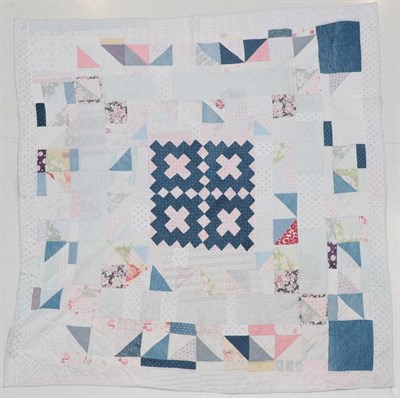 Lot 2024 - Late 19th/Early 20th Century Reversible Patchwork Quilt, with a central square pattern of mid...
