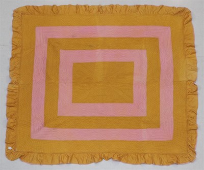 Lot 2038 - Early 20th Century Durham Reversible Quilt, with mustard and pink graduating frames to one side and