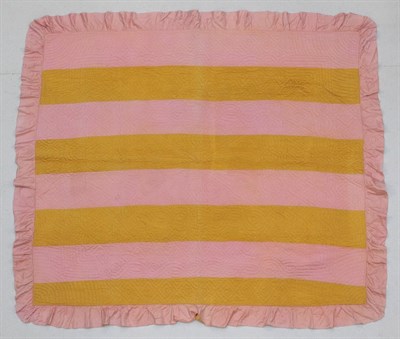 Lot 2038 - Early 20th Century Durham Reversible Quilt, with mustard and pink graduating frames to one side and