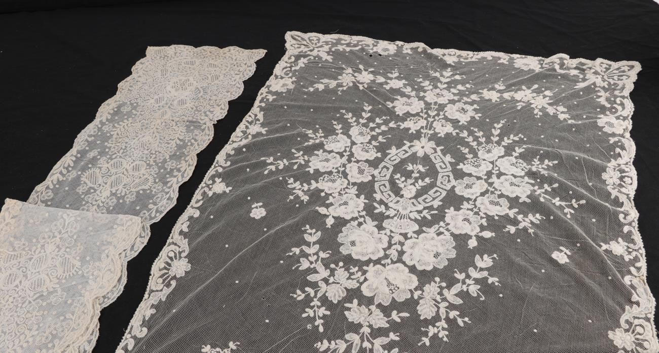 Lot 2076 - Large Late 19th Century Limerick Lace Shawl, embroidered overall with an oval cartouche with...