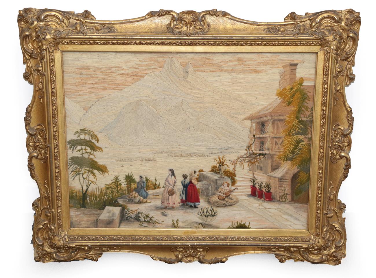 Lot 2096 - A 19th Century Wool and Silk Work Picture, depicting a European scene worked primarily in long...