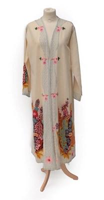 Lot 2098 - A Circa 1920's Indian/Nepalese Cream Wool Wedding Jacket, the back, cuffs and lower of jacket...