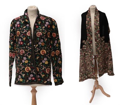 Lot 2100 - Early 20th Century Possibly Eastern Floral Embroidery, has been remounted on a later black wool...