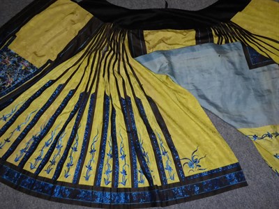 Lot 2105 - Qing Dynasty Chinese Yellow Figured Silk Pleated Wedding Skirt, with blue silk embroidered...