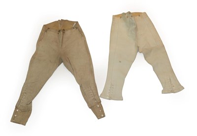 Lot 2114 - A Pair of Late 18th Century Buckskin Breeches, with fall front and button fastening, lace up...