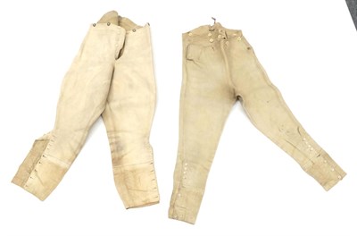 Lot 2115 - A Pair of Late 18th Century Buckskin Breeches, with fall front and button fastening, lace up...