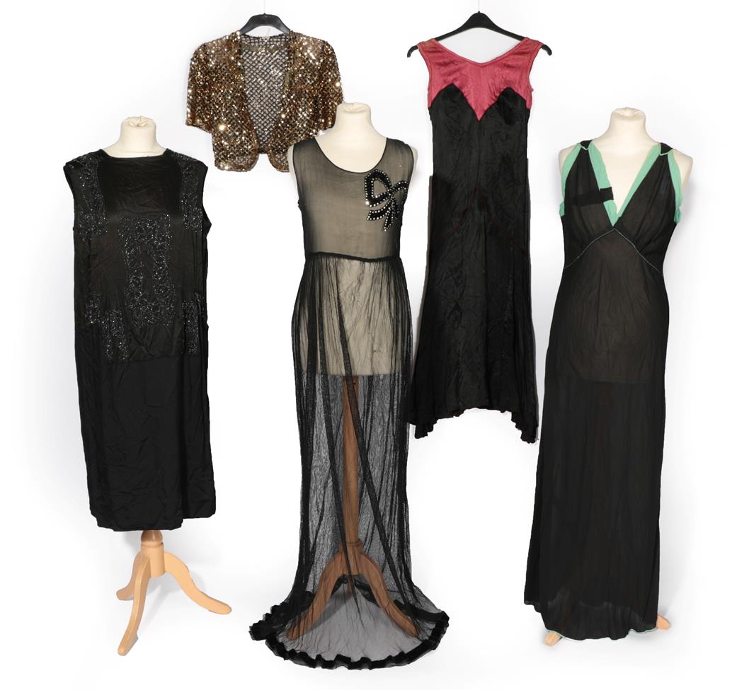 Lot 2130 - Four 1920's Evening Dresses, comprising a black beaded silk sleeveless dress with panels of gun...