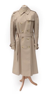 Lot 2177 - Burberrys Ladies' Belted Double Breasted Trench Coat, stone coloured with buttoned slit...