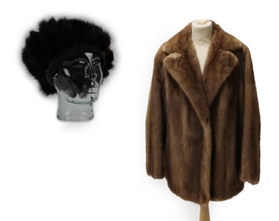 Lot 2180 - Marcus Furriers Light Brown Mink Jacket and a dark mink sectional hat (2)