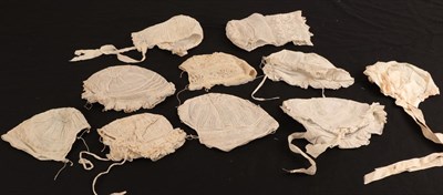 Lot 2228 - Ten 18th and 19th Century White Cotton Baby Bonnets, with embroidered details, lace insertions,...