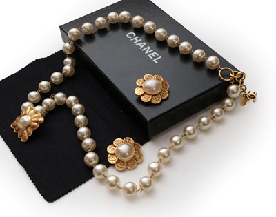 Lot 2268 - Chanel Two Row Simulated Pearl Necklace, the 19:21 simulated pearls chain linked to a kite...