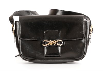 Lot 2280 - Céline Paris Black Leather Shoulder Bag, with flap closure secured by a gilt metal rope twist bow