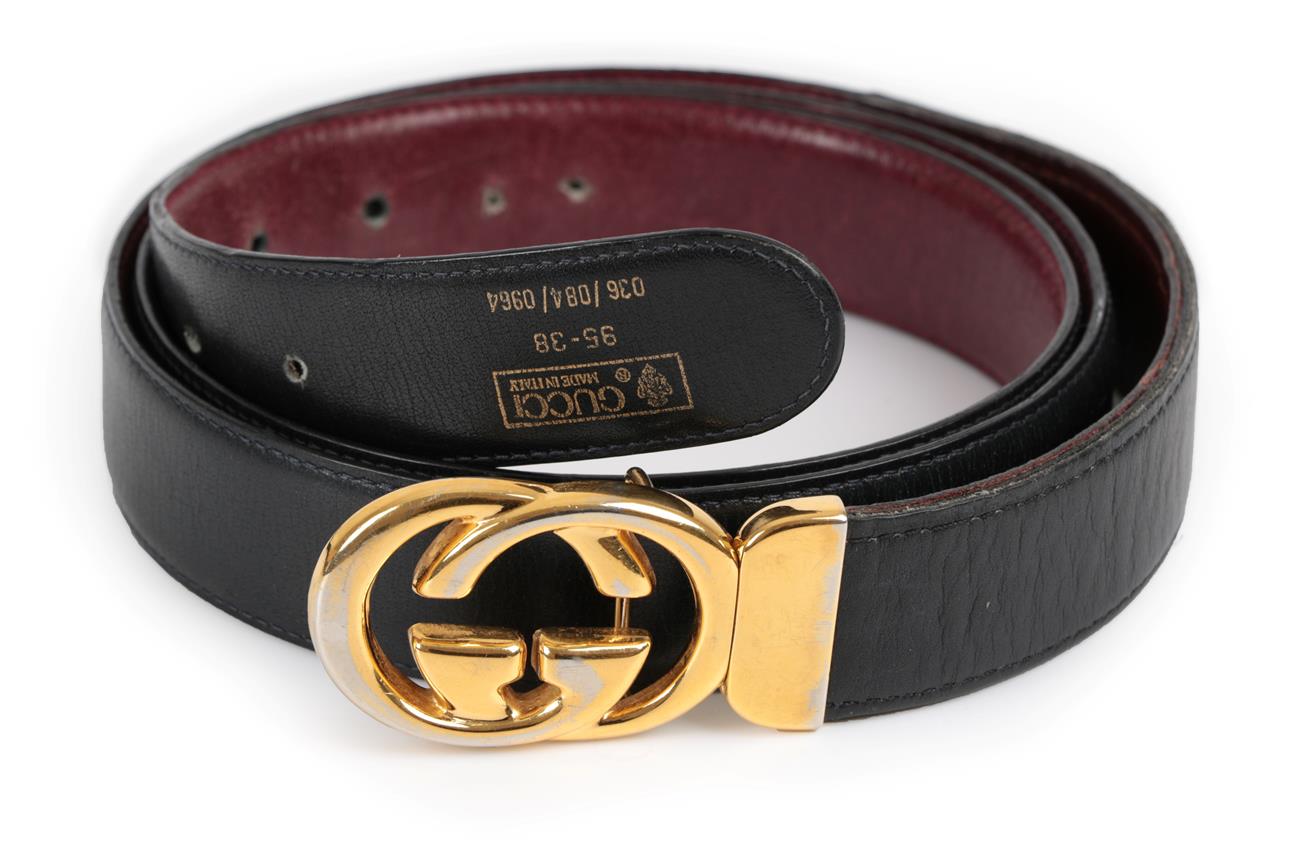 Lot 2287 - Gucci Black Leather Belt, with gilt metal 'GG' buckle, (stamped size 95-38)