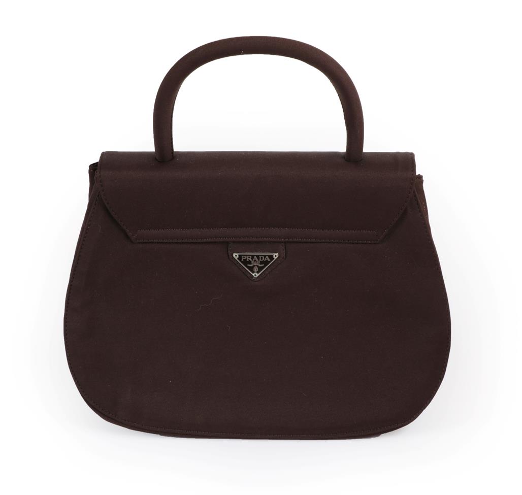 Lot 2313 - Prada Dark Brown Handbag, with half hoop handle and triangular fob to reverse, 19.5cm by 26.5cm