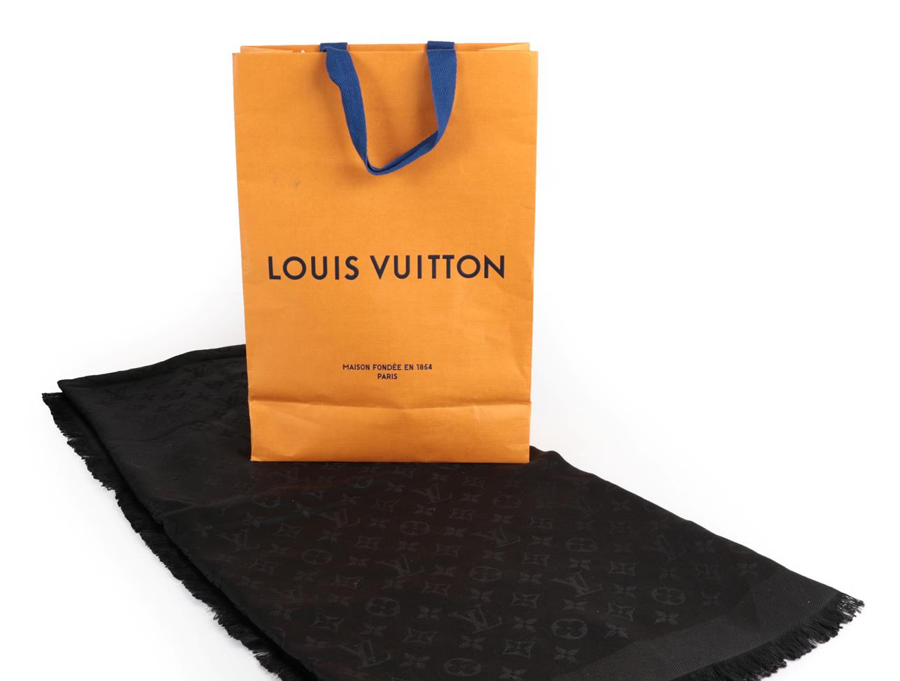 Lot 2321 - Louis Vuitton Black Silk and Wool Monogram Scarf / Shawl, with fringed hem, 140cm square,...