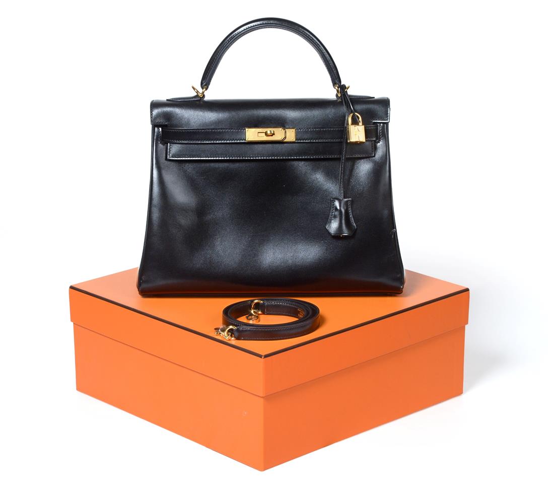 Hermes - Small Black Leather Handbag on Designer Wardrobe