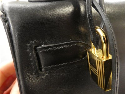 Lot 2322 - Hermès 'Kelly' Black Leather Handbag, 2008, with double strap closure of twist lock, with...