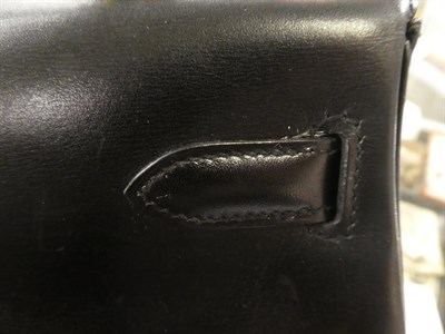 Lot 2322 - Hermès 'Kelly' Black Leather Handbag, 2008, with double strap closure of twist lock, with...