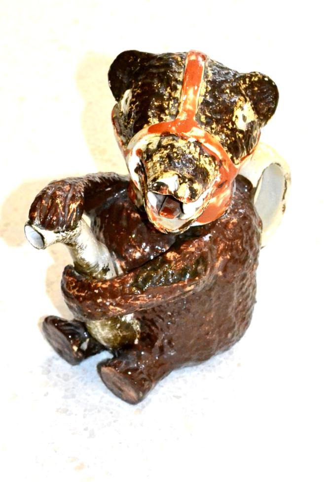 Lot 13 - A Staffordshire Pottery Bear Teapot and Cover, circa 1820, the seated animal with brown...