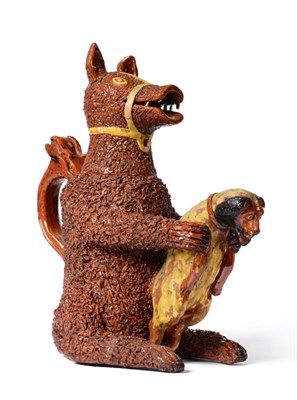 Lot 18 - A Brown Glazed Bear Jug and Cover, circa 1830, modelled as a seated animal with shredded clay...