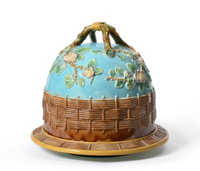 Lot 27 - A George Jones Majolica Cheese Dome and Stand, circa 1875, moulded with blossoming branches...