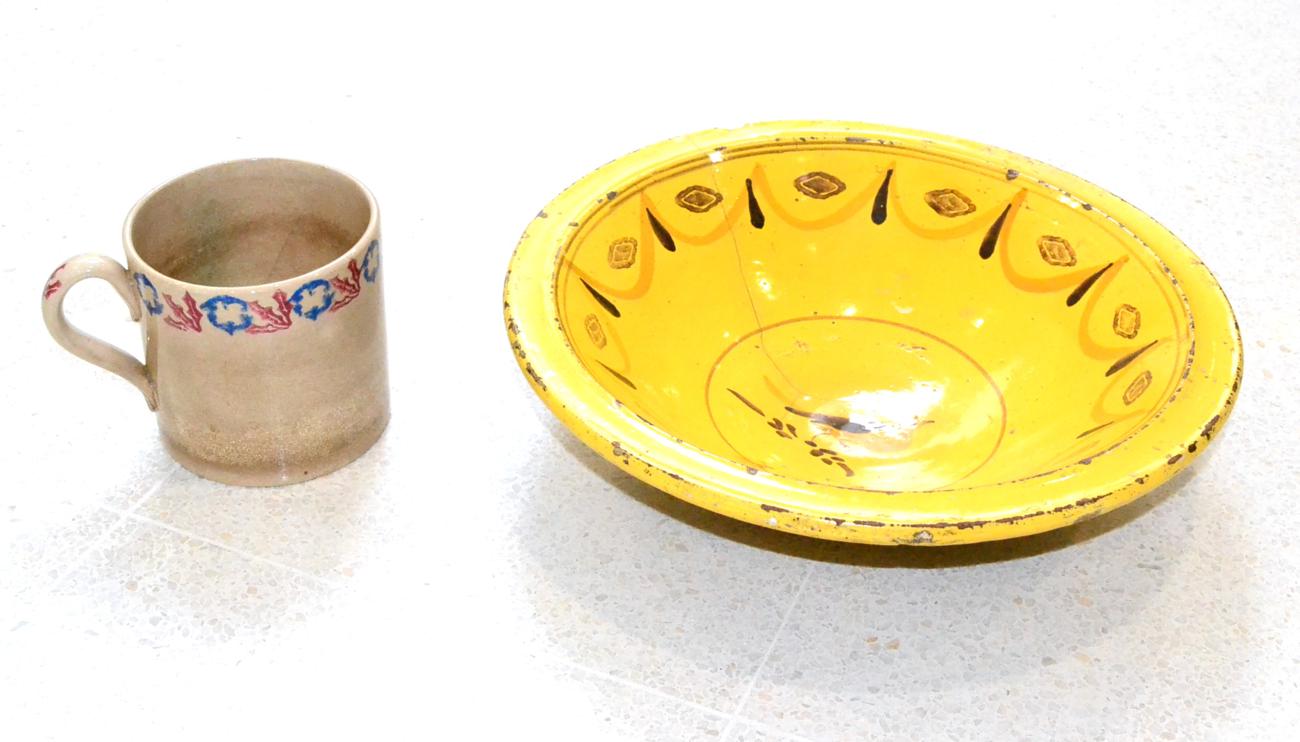 Lot 37 - A Continental Yellow Glazed Pottery Basin, 17th or early 18th century, painted in ochre and...