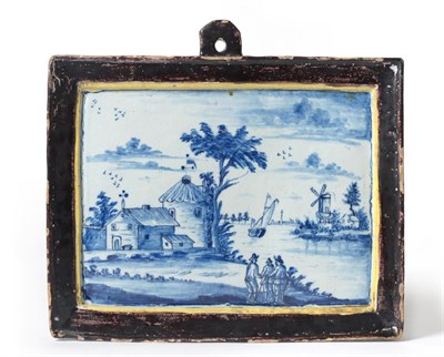 Lot 40 - A Dutch Delft Wall Plaque, 18th century, of rectangular form, painted in blue with figures in a...