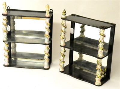 Lot 44 - A Matched Pair of Dresden Mounted Ebonised and Mirror-Backed Wall Shelves, early 20th century, with
